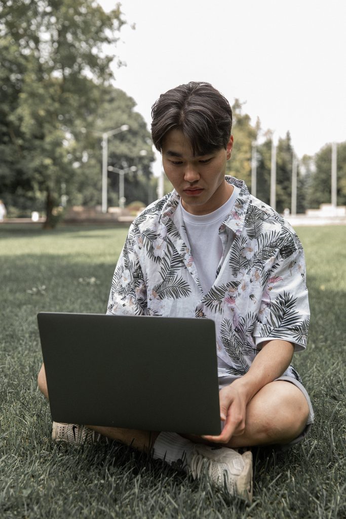 guy looking at laptop